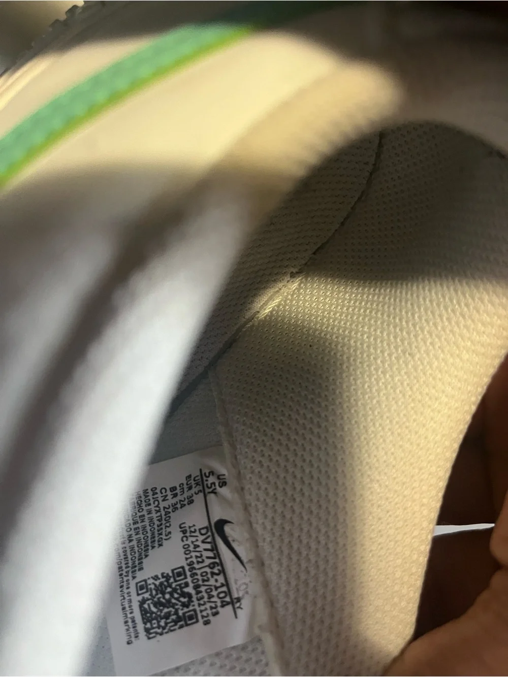 Nike White Sneakers with Light Green Swoosh Accent